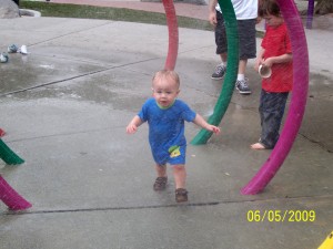 Running through the water at Liberty Park.