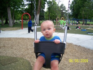 Swinging at Liberty Park.