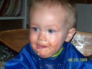 Yogurt face, note the shiny eyebrow paint.  LOL!