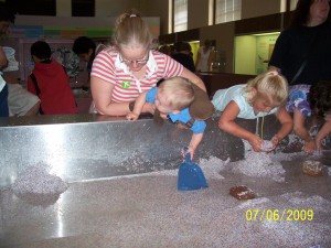 Playing in fancy wet sand at UMNH.