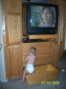 Climbing in the drawer.