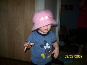 Aiden got into my hat drawer and found this dashing number.