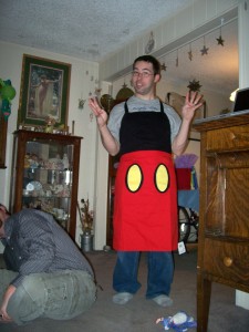 Brandon modeling his new Mickey apron (the pose was my mom's idea).