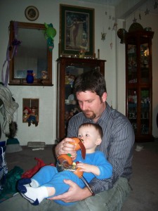 Aiden kissing his slinky dog.  