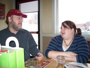 Erica and dad chatting it up.