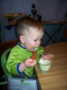 Tasting the frosting for Santa's cookies...