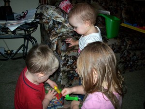 Playing with his cousins.