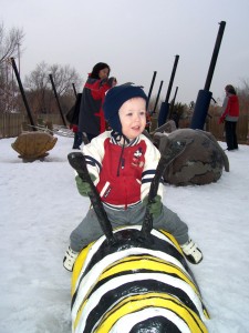 Sitting on the caterpillar at Hogle Zoo.