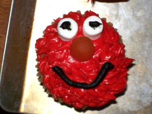 Close up of Elmo cupcake.