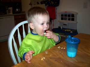 Aiden eats his first ice cream sandwich!