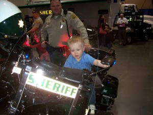 Riding a police motorcycle.