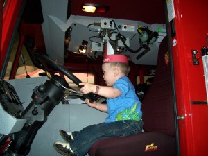 Driving a fire engine.