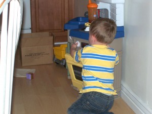 Baking some cookies in his oven.