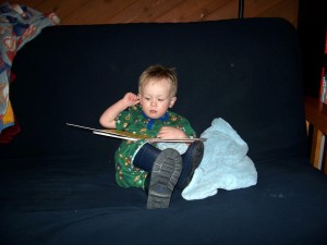 Reading in my new hand me down rain boots.