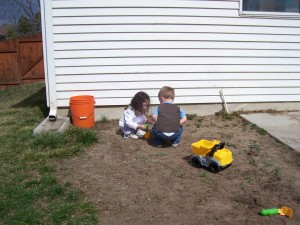 Playing in the dirt with a friend.