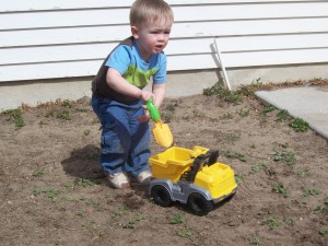 Dumping dirt in my tractor.