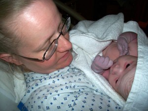 Mom holding baby Lucas for the first time.