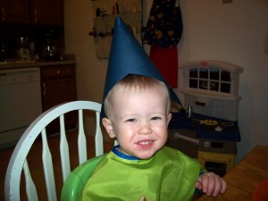 Aiden in his party hat.