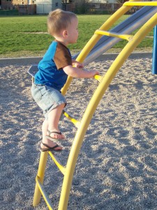 Aiden's new favorite past time, climbing.